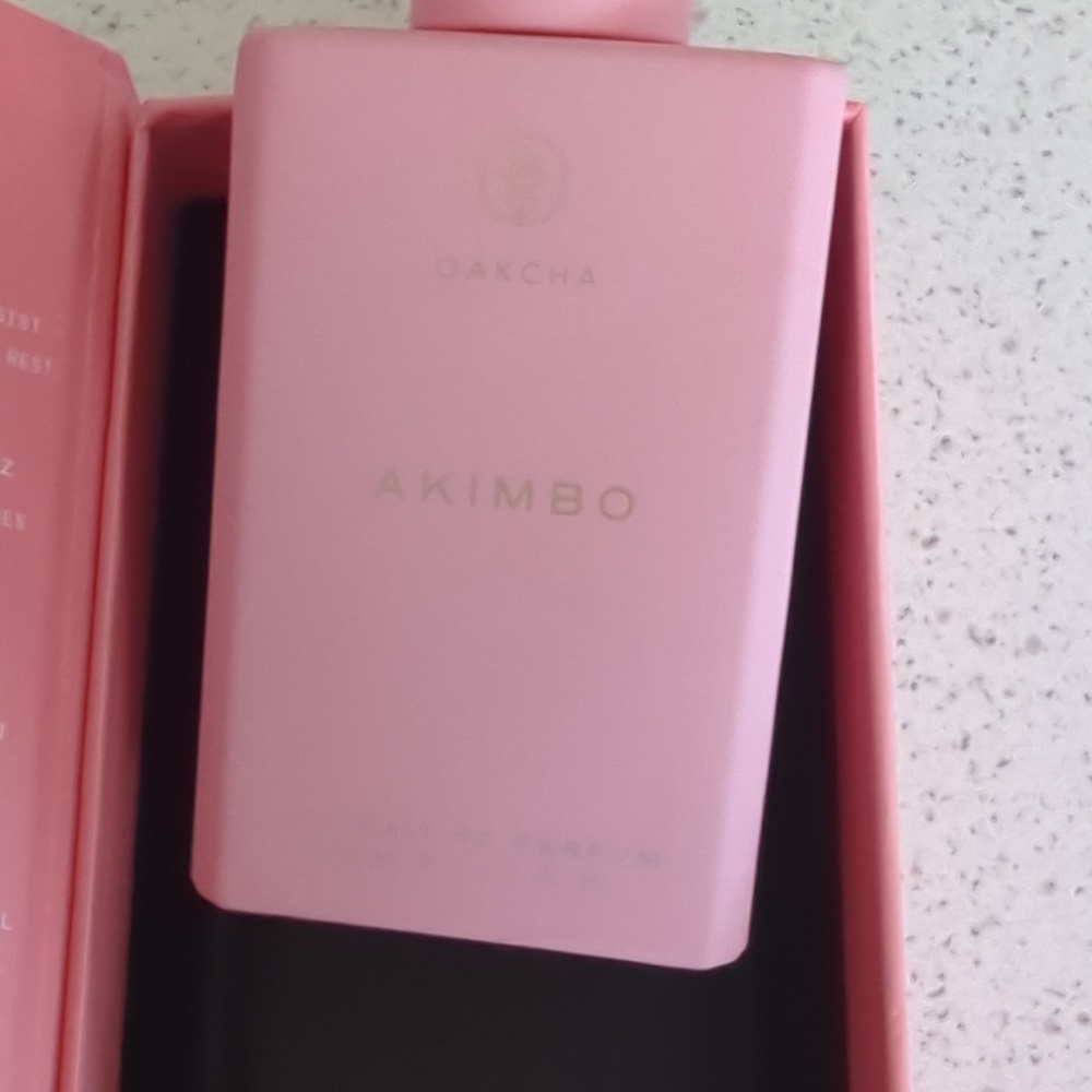 Akimbo Pink Fragrance Bottle with Gold Logo